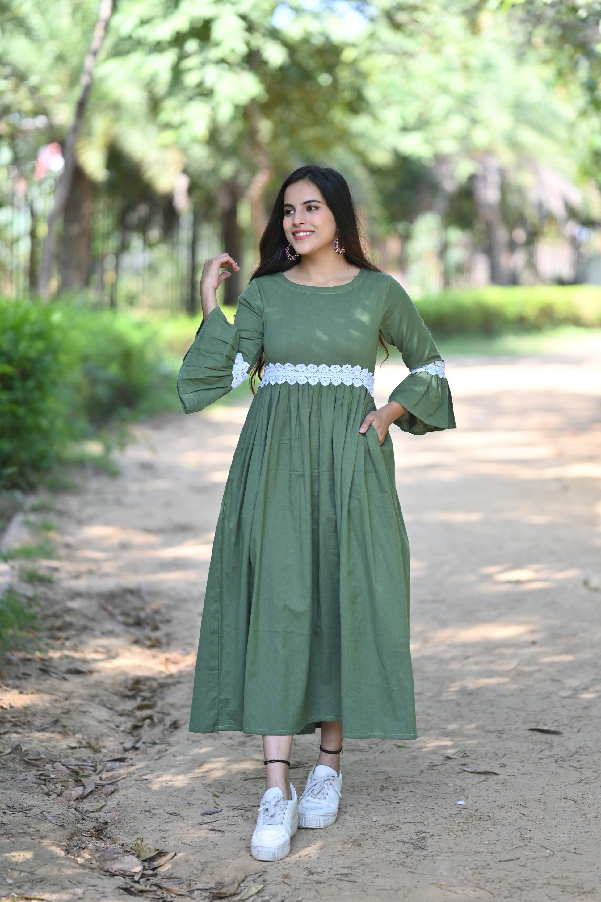 sage green spring dress Audrey Sleeveless A-Line Mini while the flared mini skirt adds movement and that playful Sage Green Criss Cross Satin